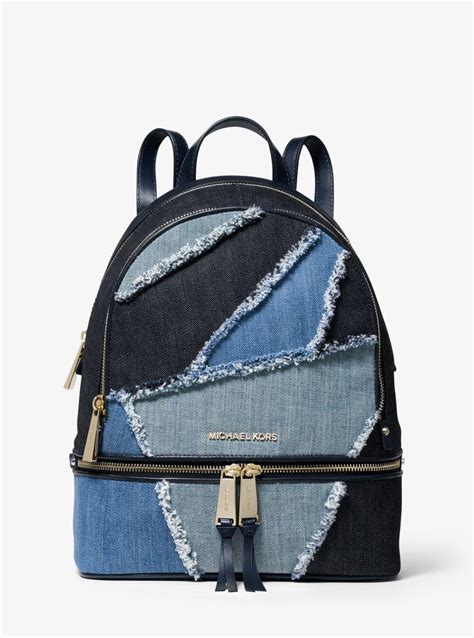 michael kors denim backpack.